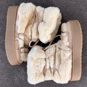American Eagle Outfitters Plush Cream and Tan Boots
